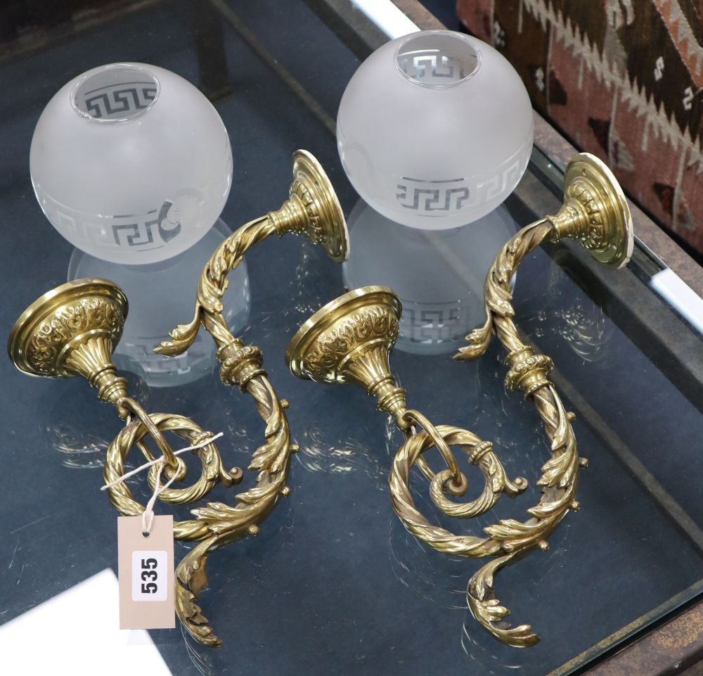 A pair of 19th century French brass single sconce wall lights with etched glass shades, height 25cm